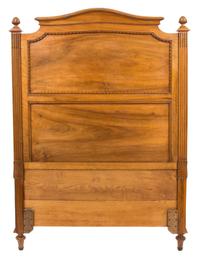 A Pair of Louis XVI Style Carved Walnut Twin Beds Height of headboard 58 inches x width 43 1/2 inches. — 19TH CENTURY