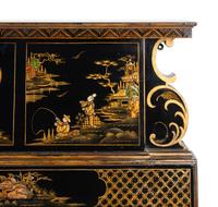An Edwardian Black and Gilt Chinoiserie Decorated Fireplace Surround — EARLY 20TH CENTURY