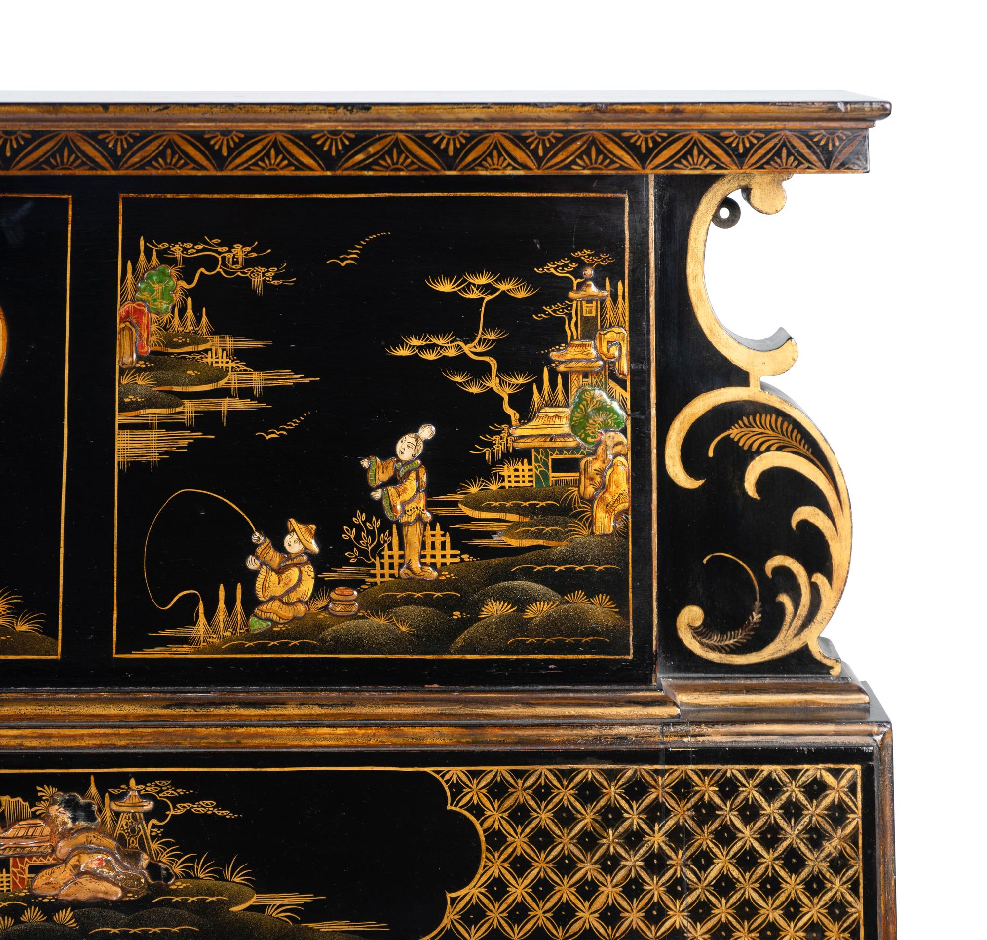 An Edwardian Black and Gilt Chinoiserie Decorated Fireplace Surround — EARLY 20TH CENTURY