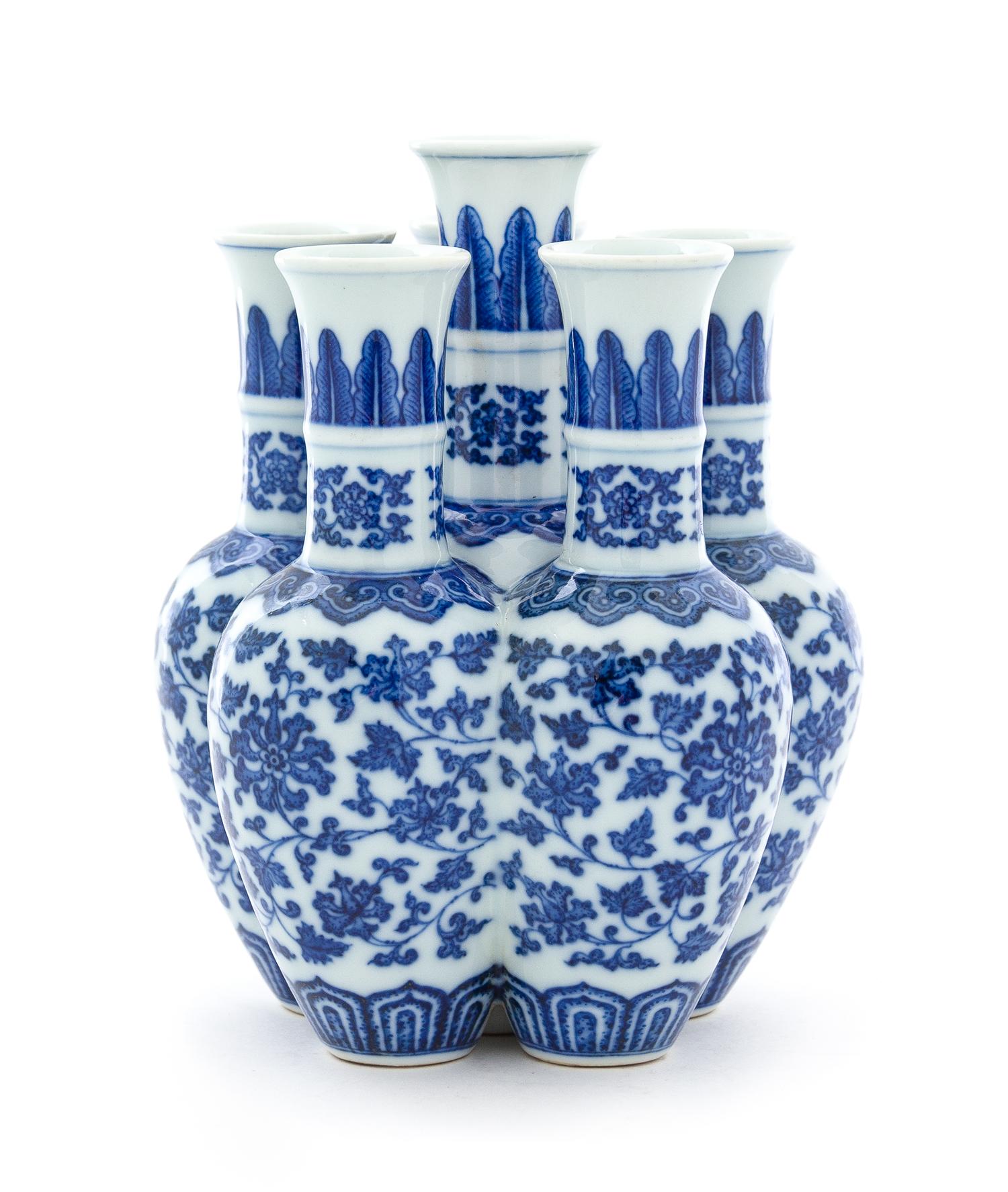 A Blue and White Porcelain Six-Spouted Vase Height 7 1/4 inches.