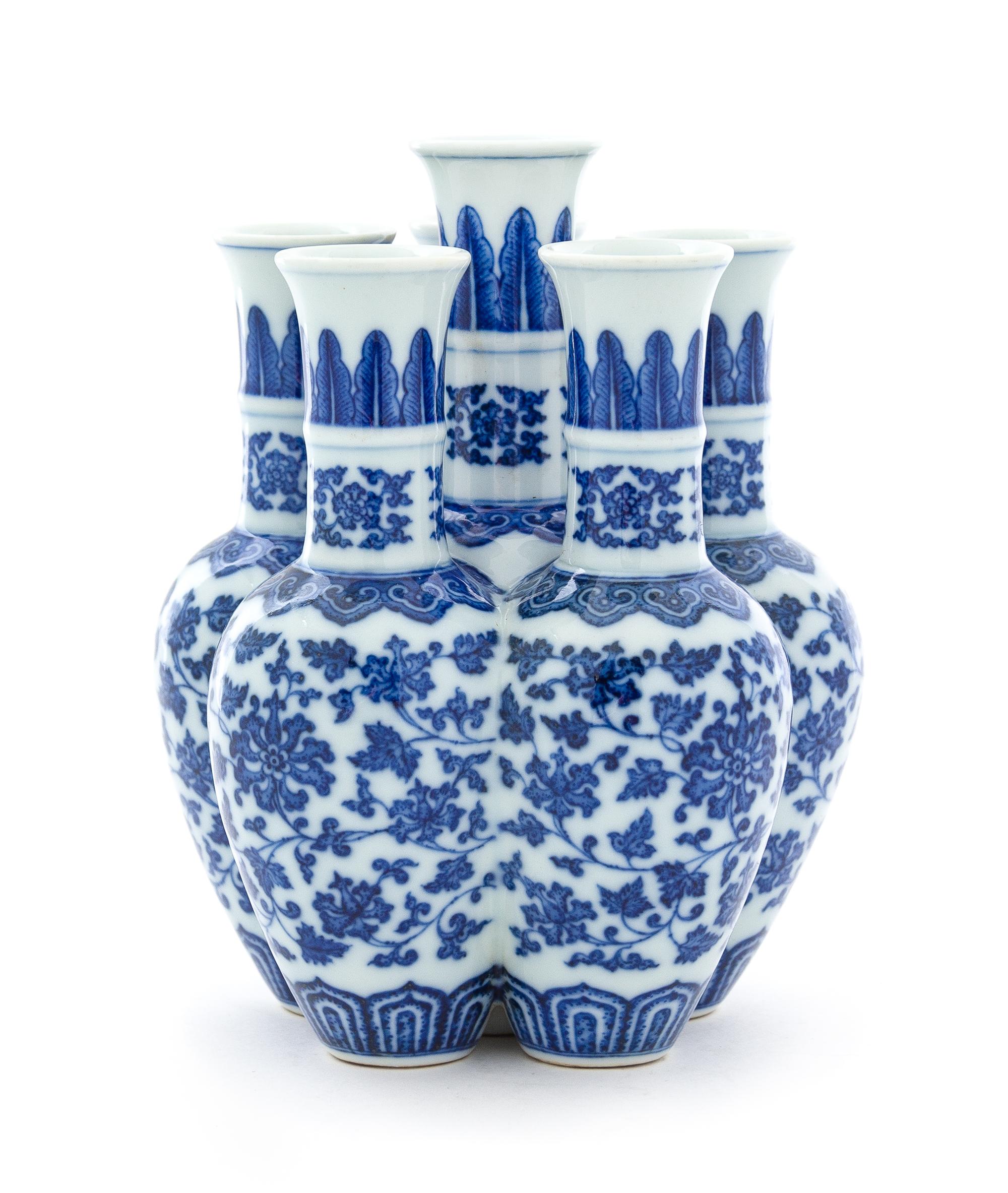 A Blue and White Porcelain Six-Spouted Vase Height 7 1/4 inches.