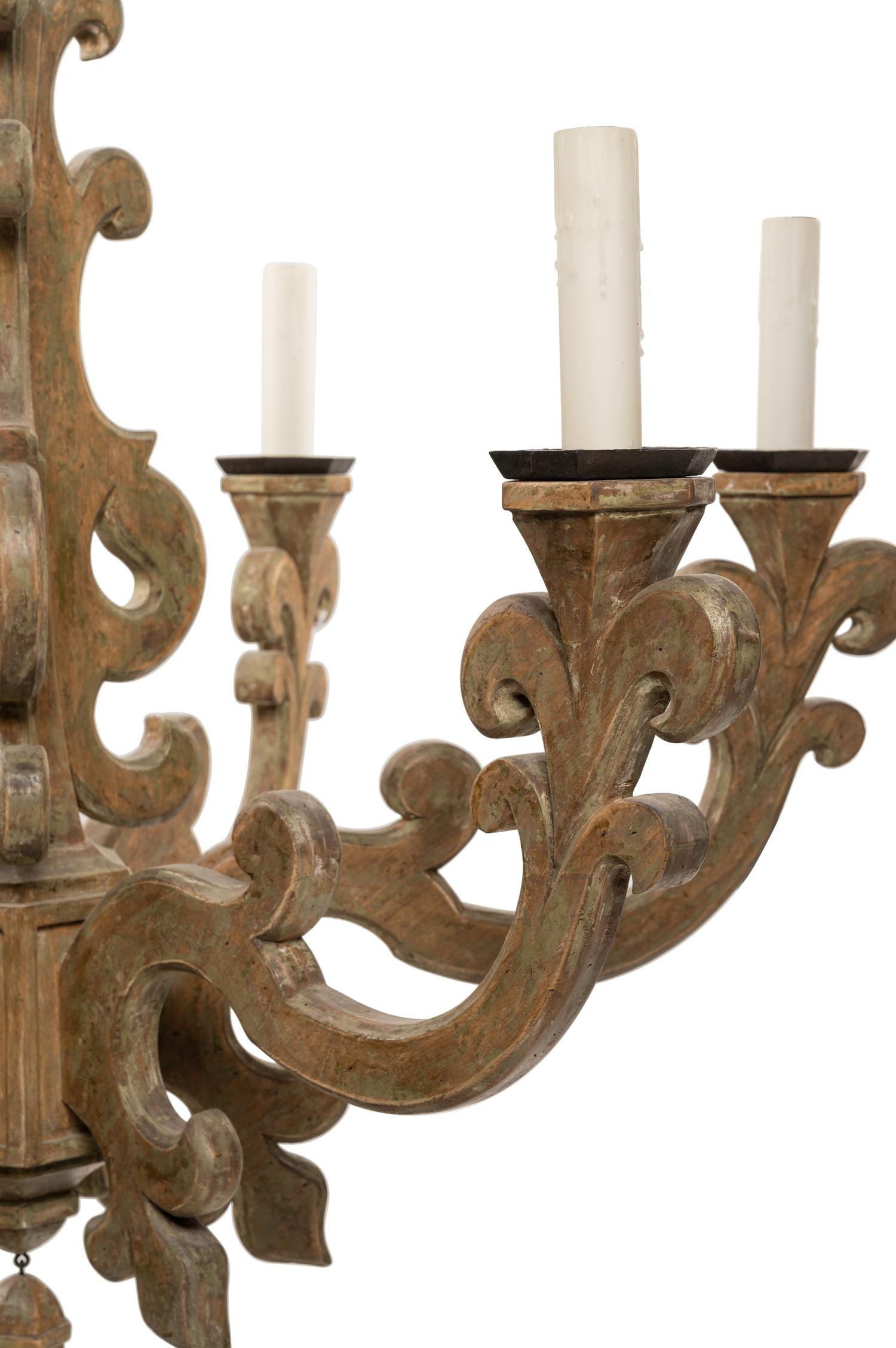 A Baroque Style Carved and Painted Six-Light Chandelier