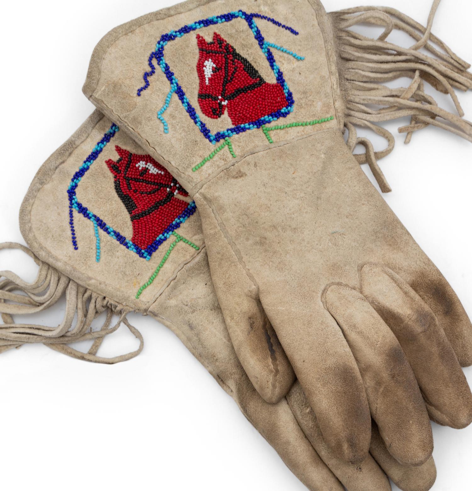 Two Pairs of Plateau Beaded Hide Gauntlets
