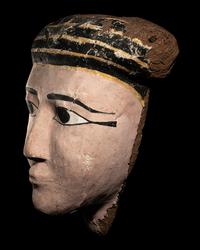 An Egyptian Wood and Painted Cartonnage Mummy Mask