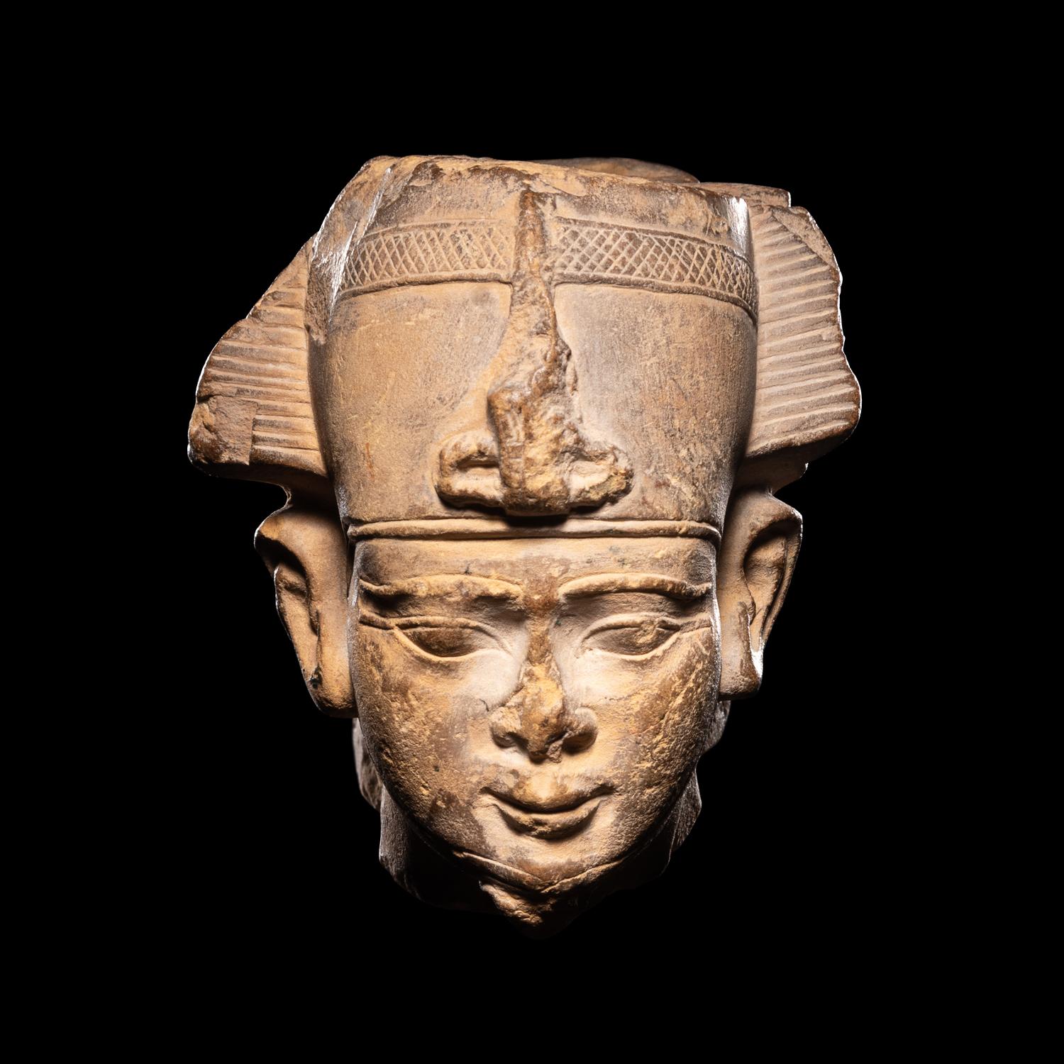 An Egyptian Limestone Head of Osiris