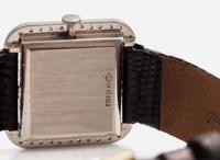 A Ladies 14K White Gold and Diamond Croton Watch