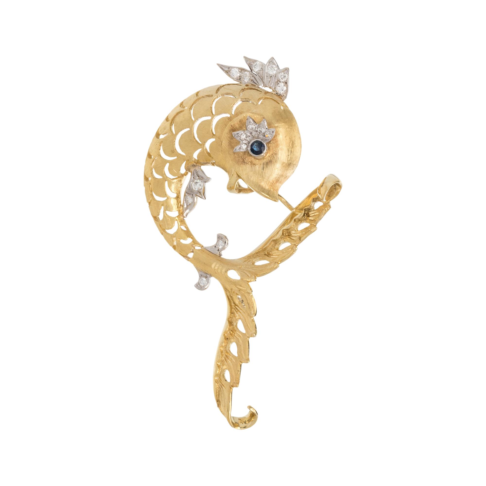 HAMMERMAN BROTHERS, BICOLOR GOLD, DIAMOND AND SAPPHIRE FISH BROOCH