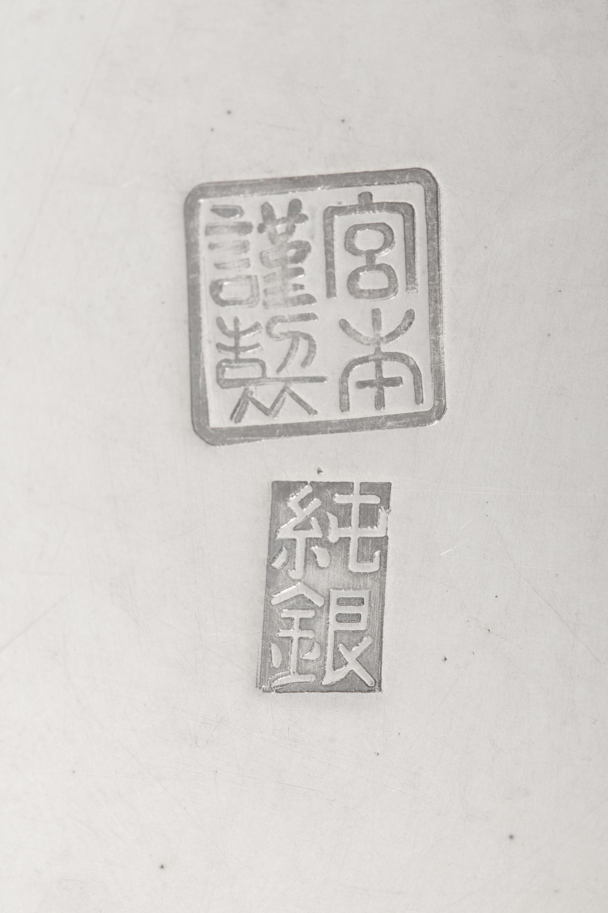 A Pair of Japanese Silver Vases