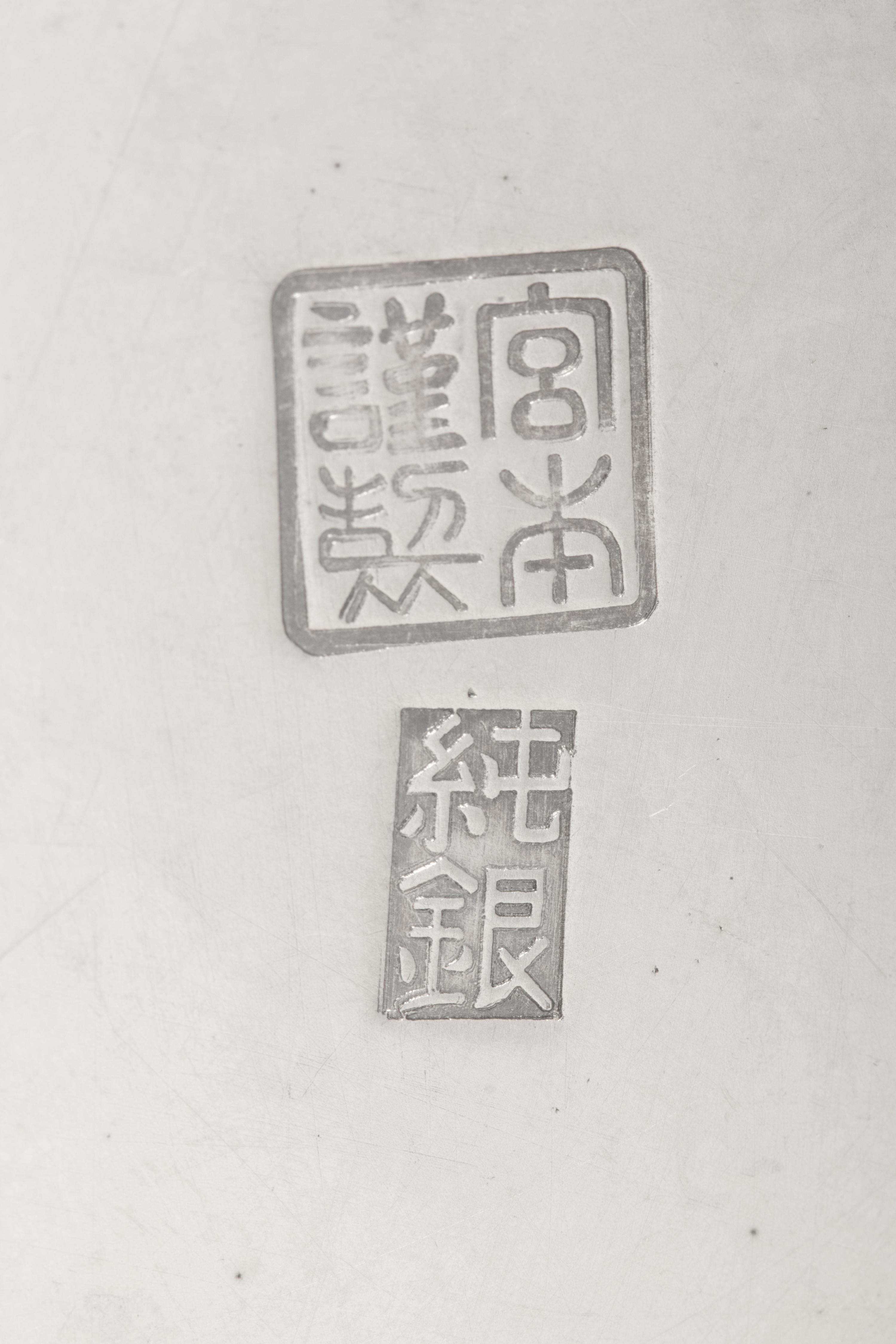 A Pair of Japanese Silver Vases