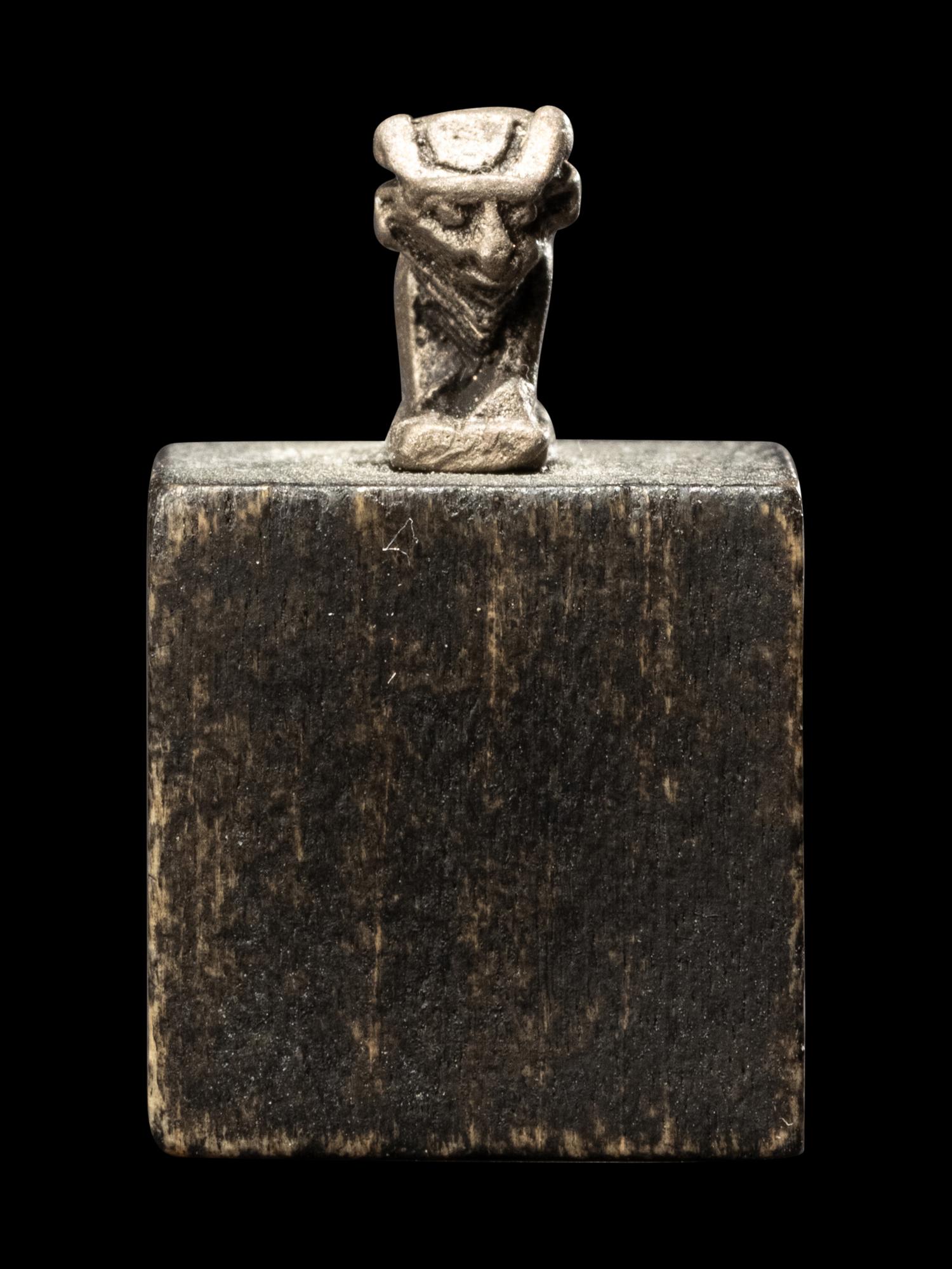 An Egyptian Silver Apis Amulet
