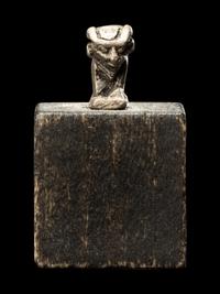 An Egyptian Silver Apis Amulet