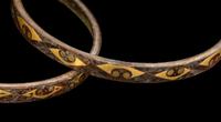 A Group of Four Chinese Gold and Silver Inlaid Bronze Fittings from Hu Vessels
