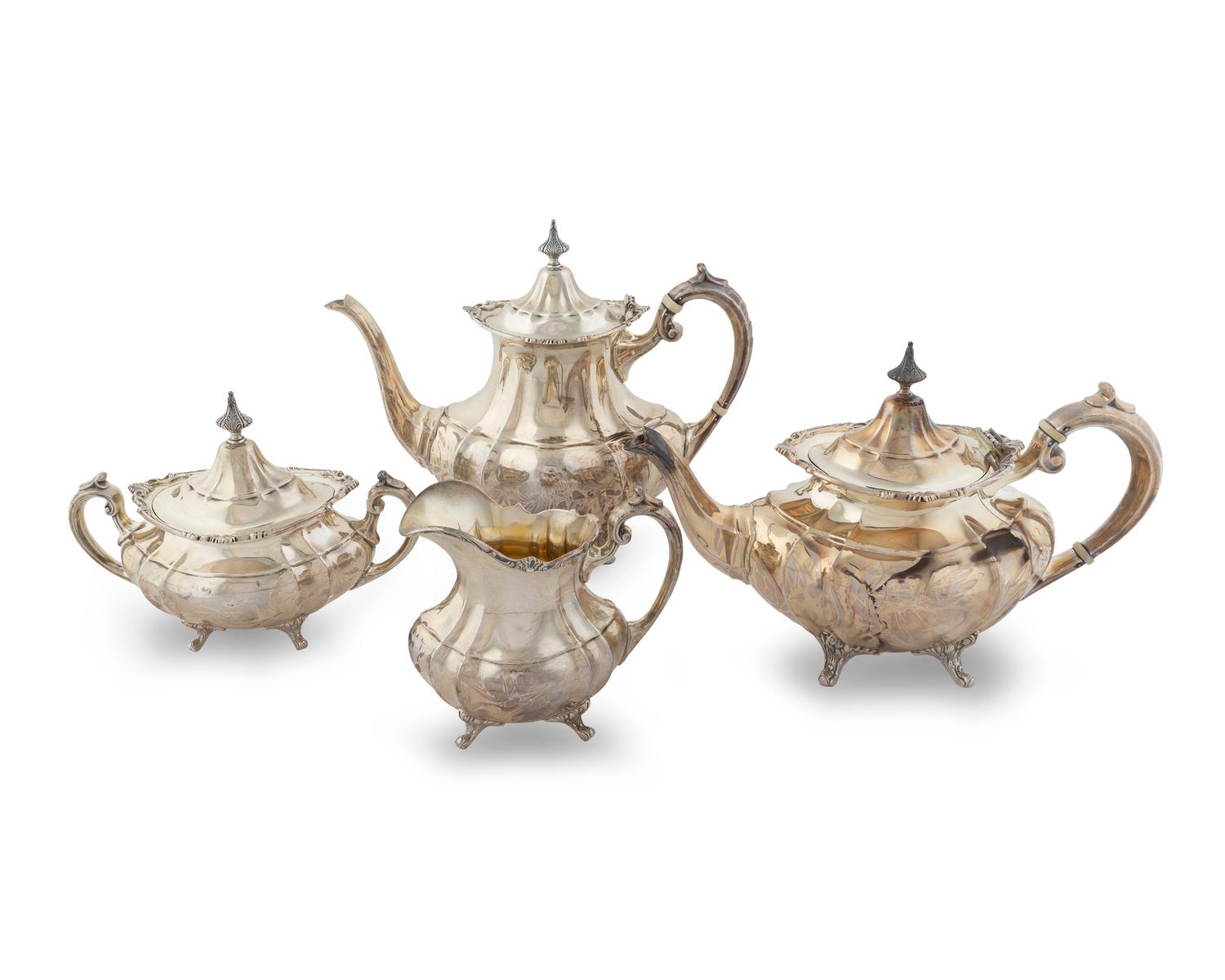 An American Silver Four-Piece Tea and Coffee Service — Reed & Barton, Tauton, Masachusetts, In the Hampton Court Pattern