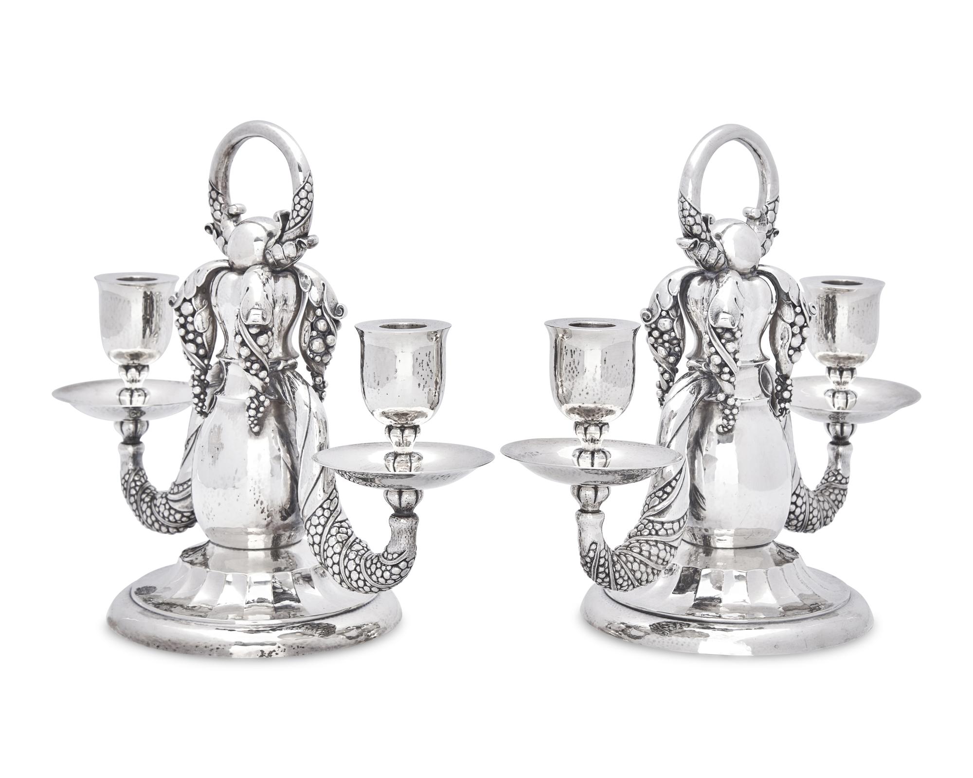 A Pair of Georg Jensen Silver Two-Light Candelabra