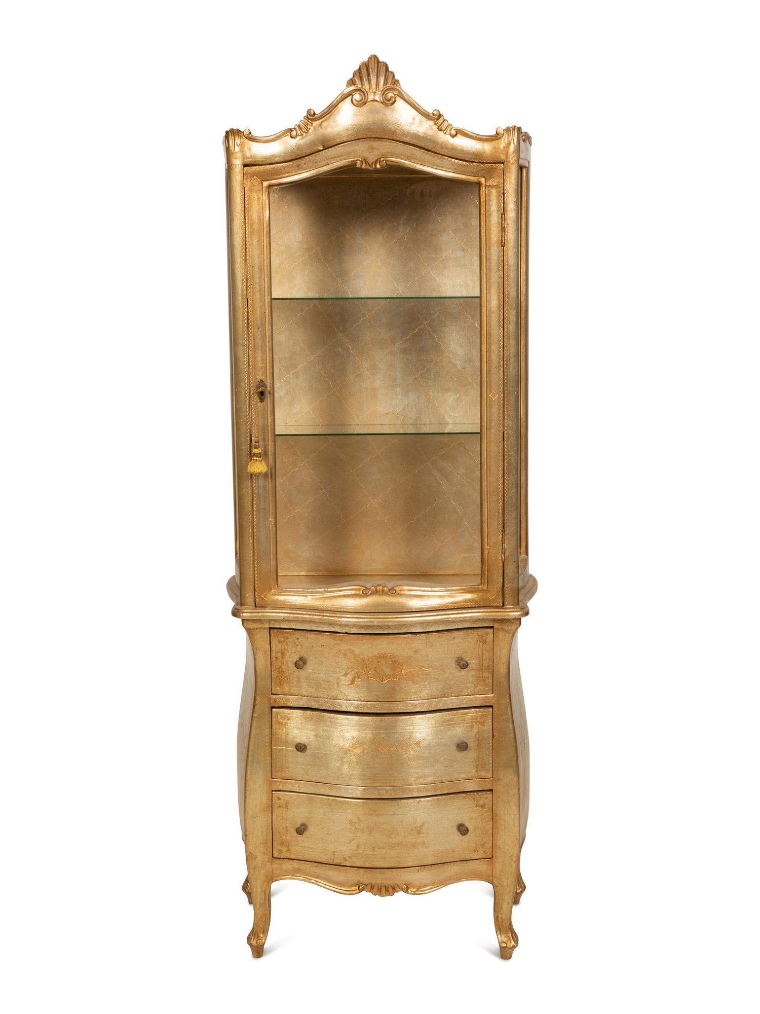 A Silvered Wood Vitrine Cabinet on Three Drawer Bombe Commode Base