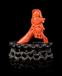 A Small Red Coral Carving Length 2 1/4 inches.