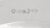 A Set of Twelve Silver Armorial Soup Plates