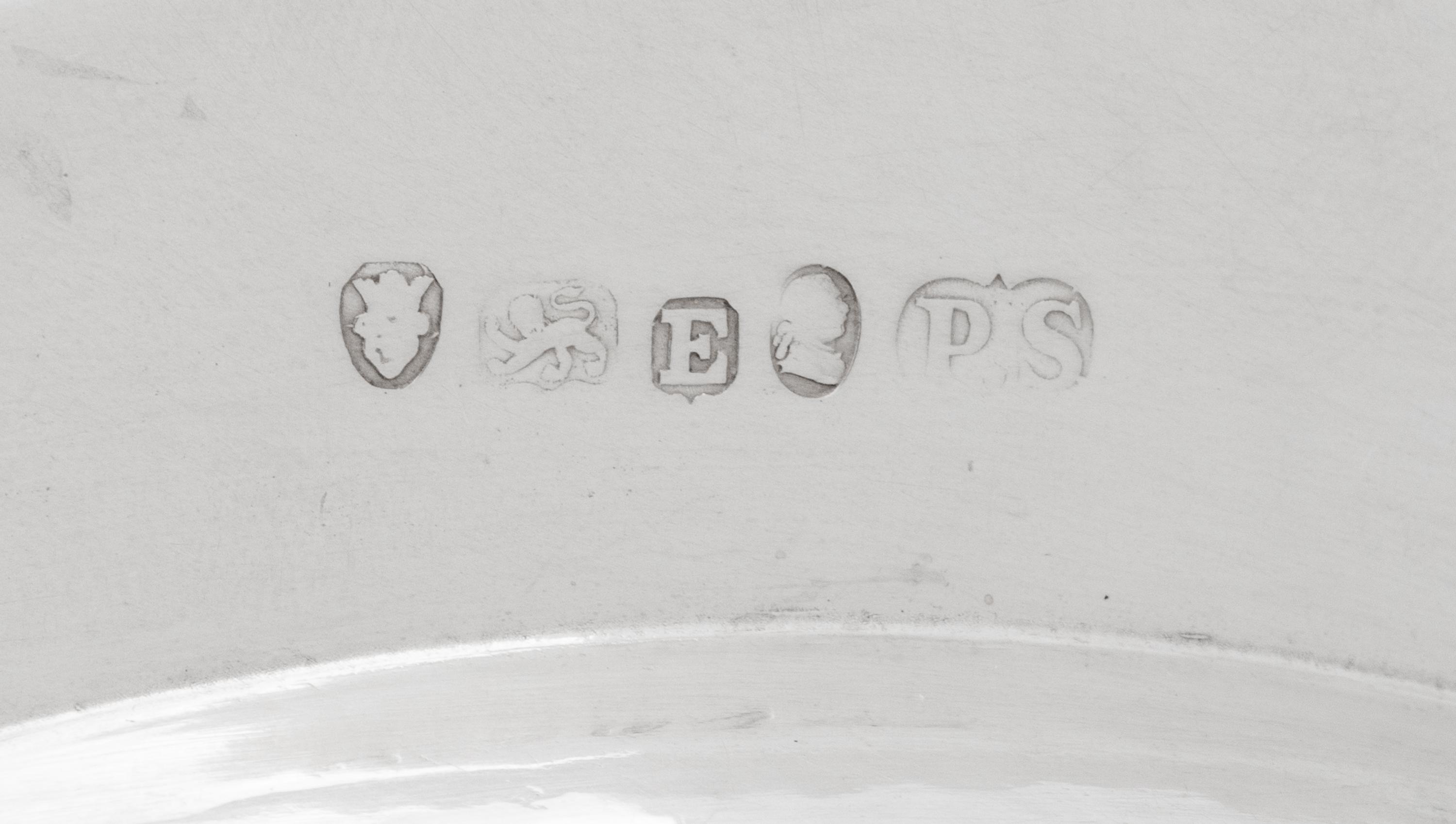 A Set of Twelve Silver Armorial Soup Plates