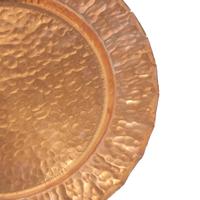 An Arts & Crafts Hammered Copper Plate