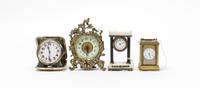 A Group of Four Miniature Clocks Height of tallest 4 1/4 inches.