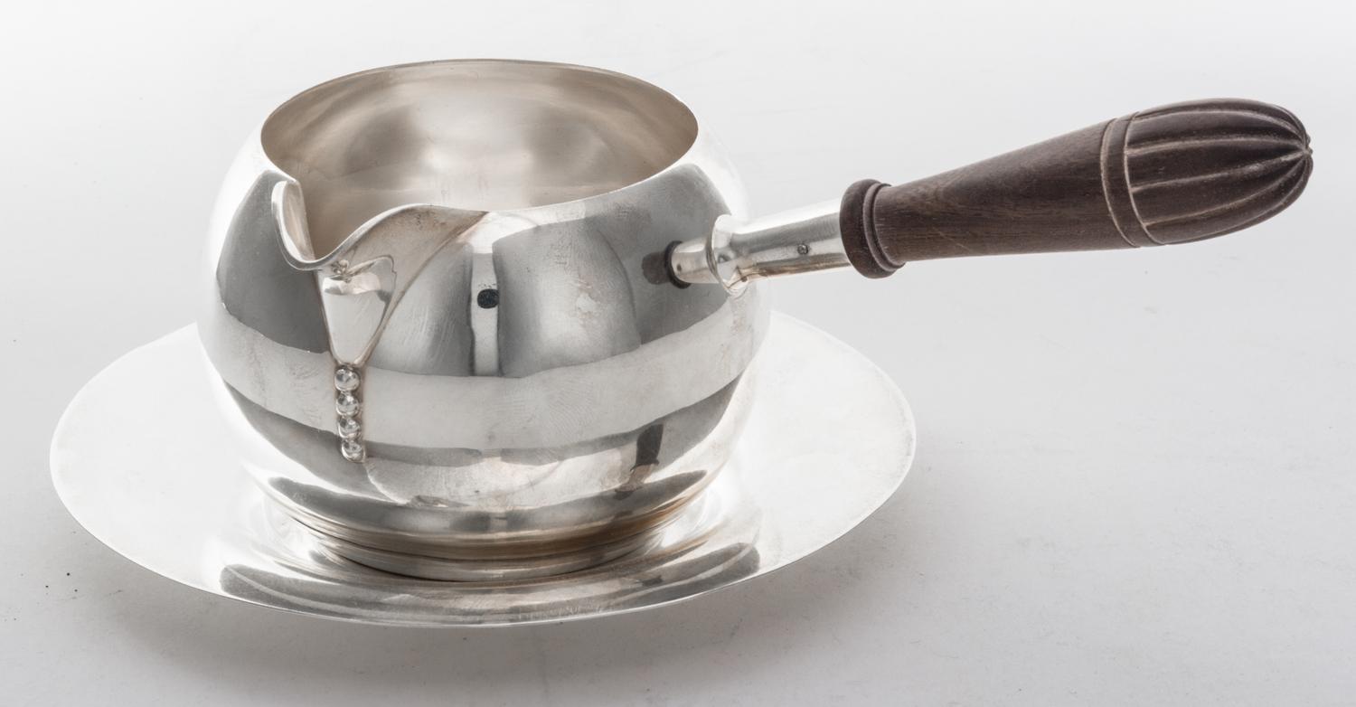 An American Silver Brandy Warmer, Tuttle Silversmiths, Boston, MA, 1933-45, of globular form with turned wood handle at right angle to