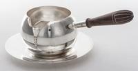 An American Silver Brandy Warmer, Tuttle Silversmiths, Boston, MA, 1933-45, of globular form with turned wood handle at right angle to