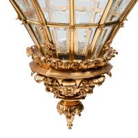 A Pair of Louis XVI Style Gilt Bronze and Glass Hall Lanterns