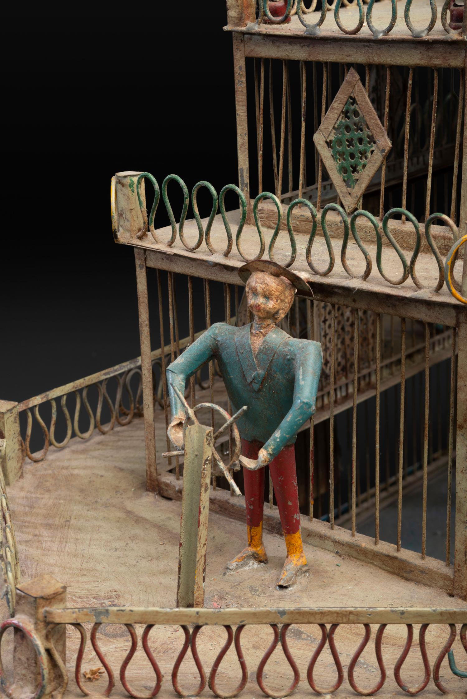 A Painted Sheet Metal and Wire Steamboat Form Birdcage