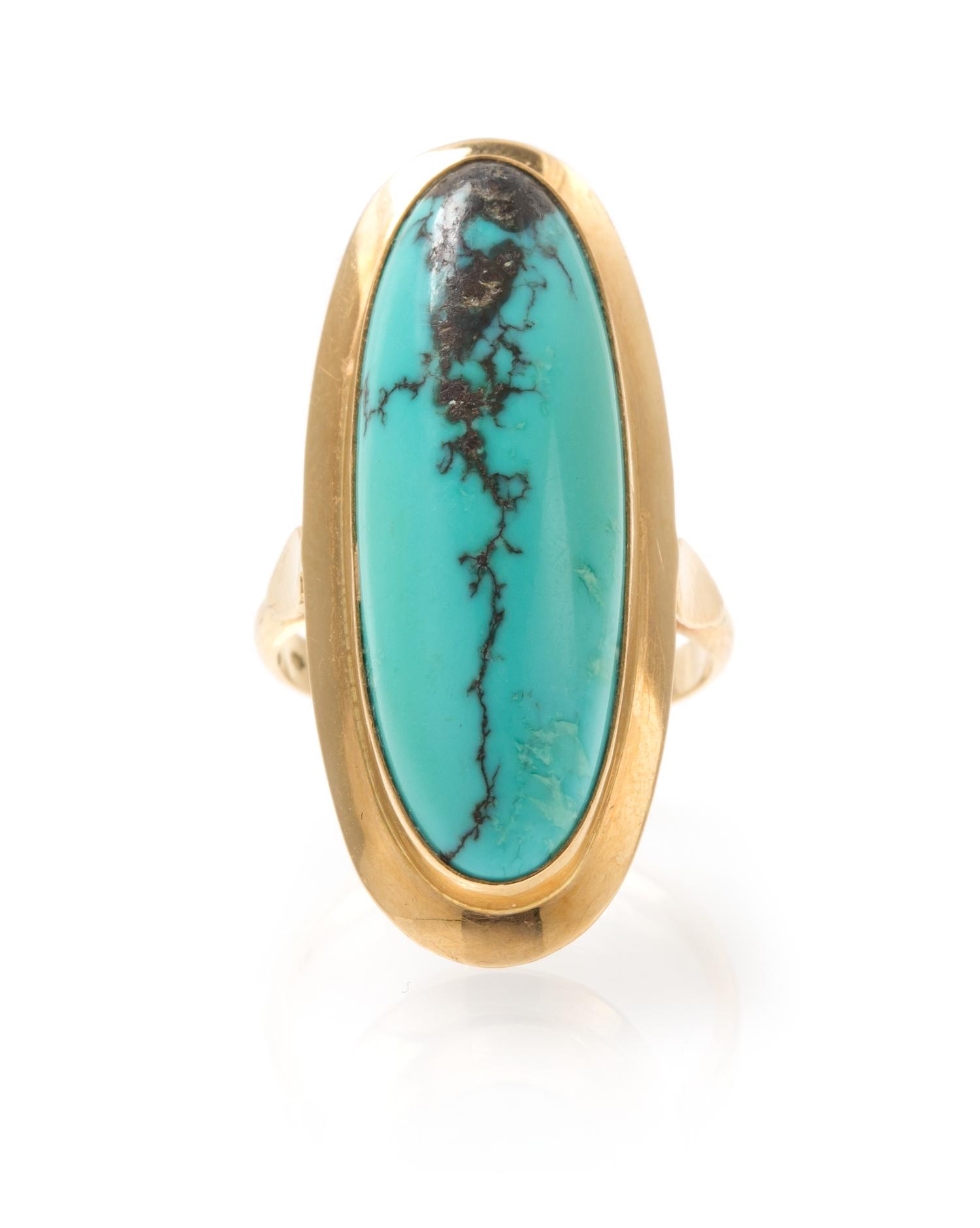 A 14 Karat Yellow Gold and Turquoise Ring, 4.40 dwts.