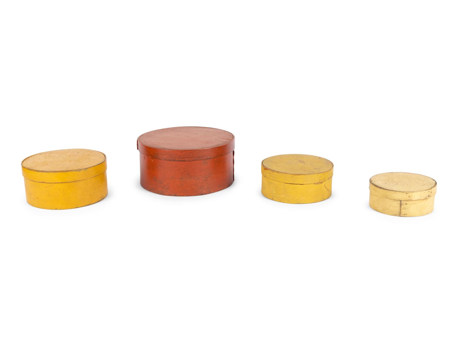 A Set of Four Graduated Shaker Boxes