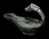 A Roman Bronze Horse Head Oil Lamp