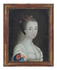 A Pair of English Reverse-Painted Glass Portraits