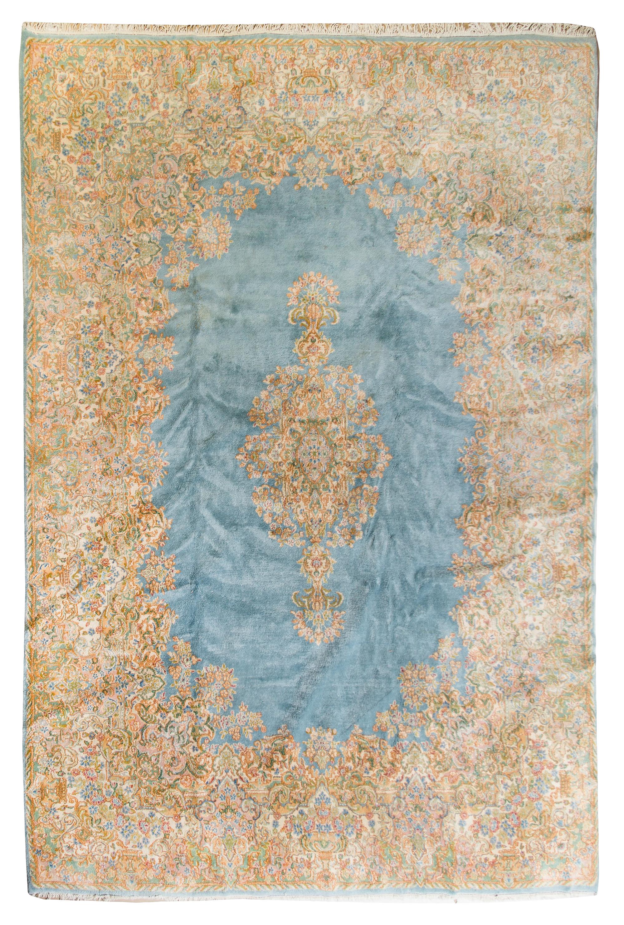 A Kirman Wool Rug 12 feet x 9 feet.