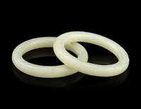 A Pair of Carved White Jade Bangles