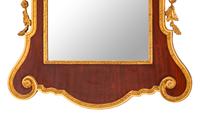 A George III Style Parcel Gilt Mahogany Mirror