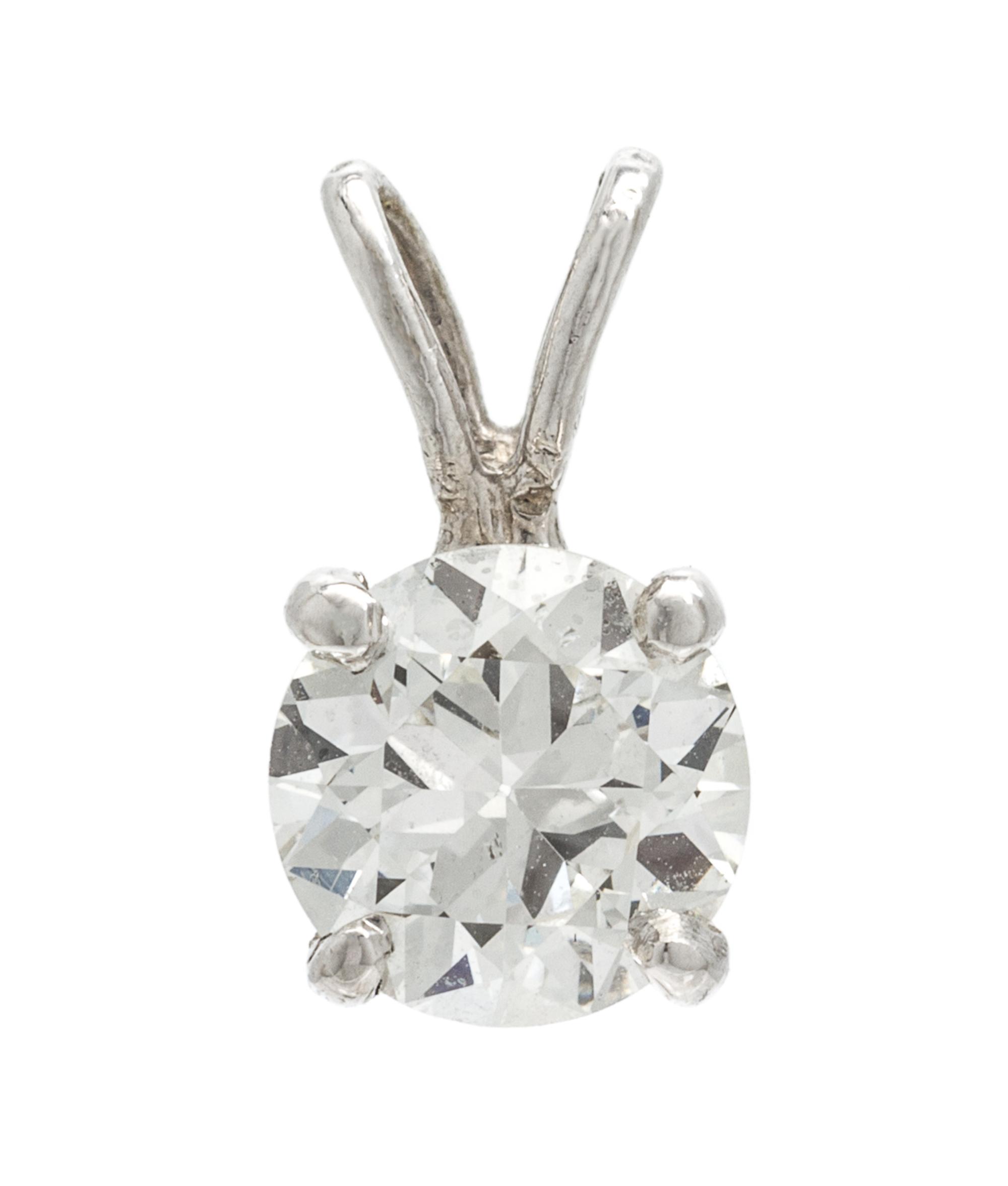 A White Gold and Diamond Solitaire Pendant, 0.60 dwts.