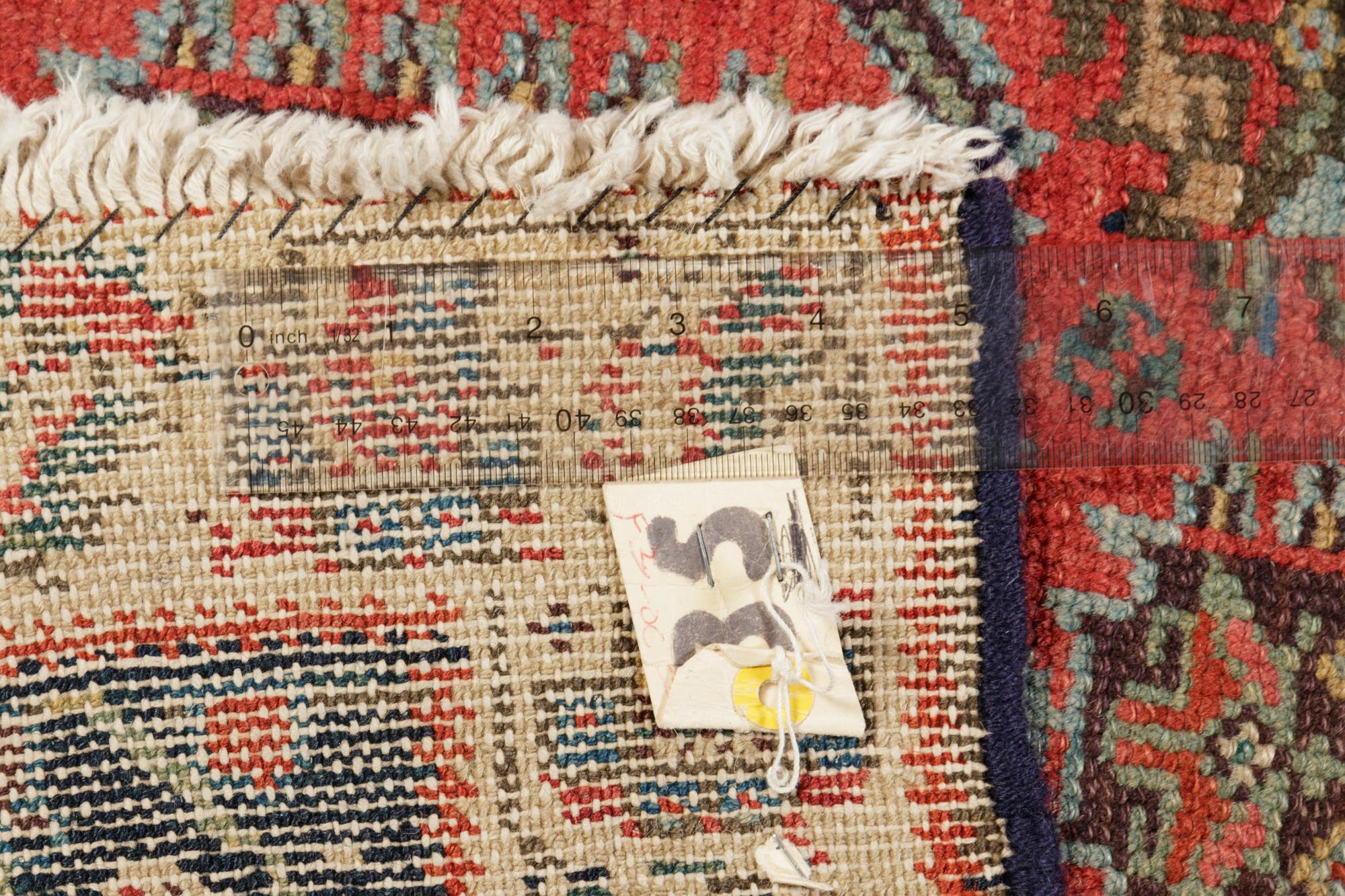 A Heriz Wool Rug
