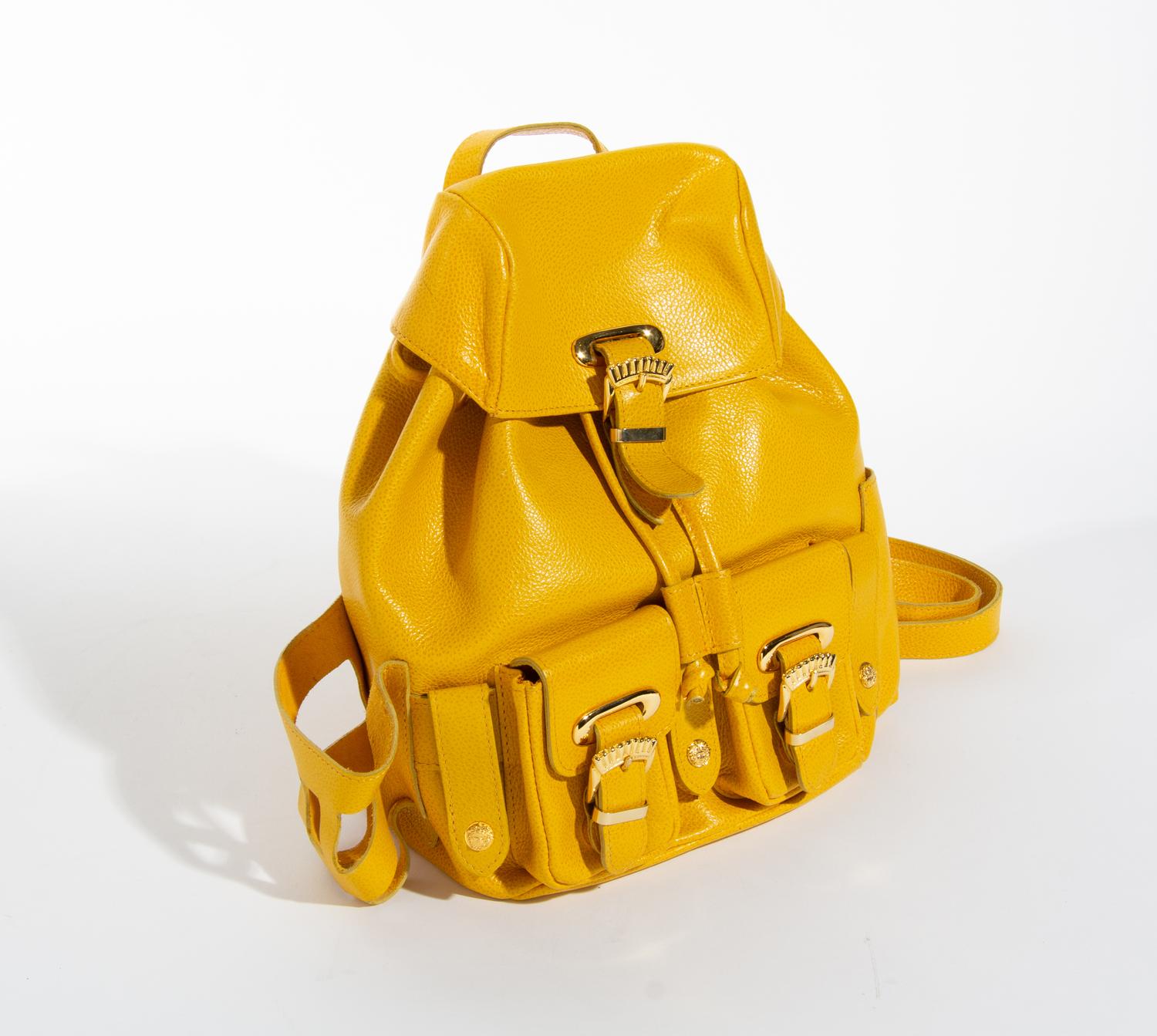 A Gianni Versace Yellow Leather Small Backpack, 9" x 8" x 3".