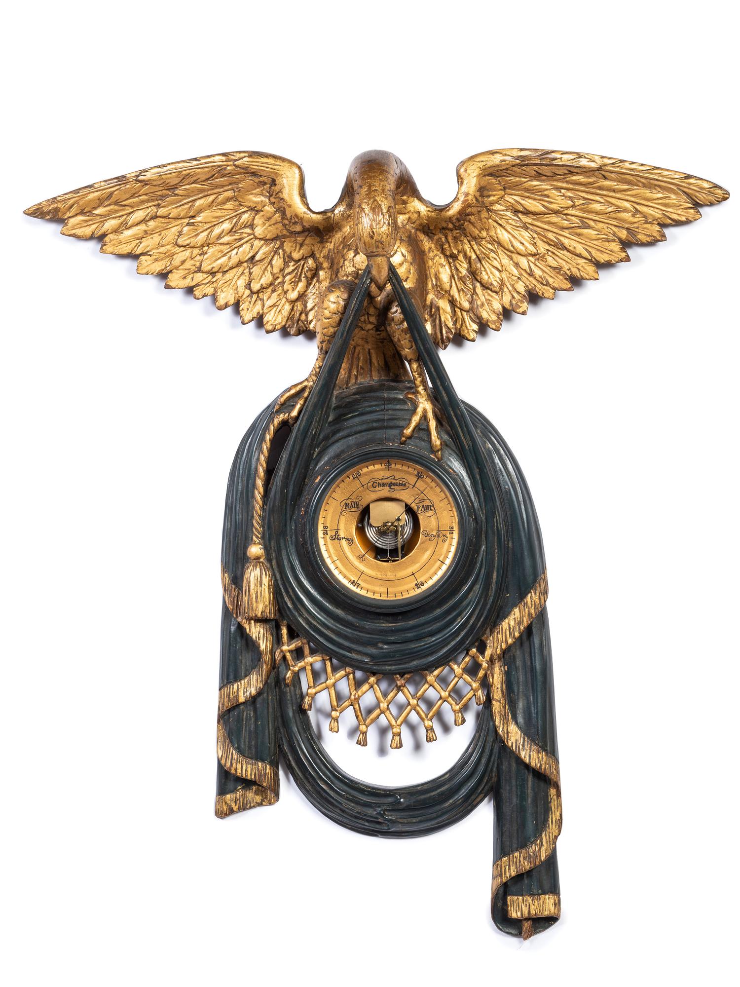 A Continental Eagle-Form Carved Gilt and Ebonized Wood Barometer
