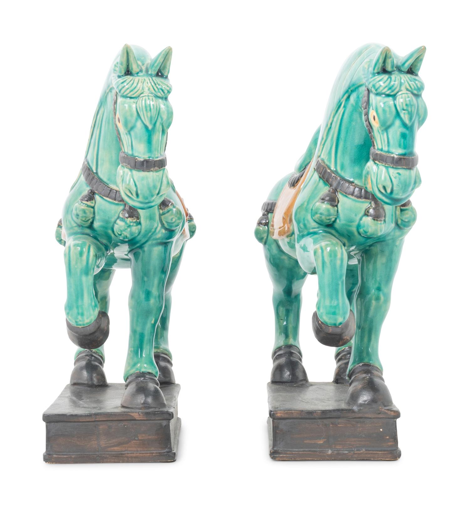 A Pair of Turquoise Glazed Pottery Horses