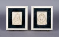 A Group of Two Continental Carved Ivory Portrait Plaques, attributed to Dieppe, Height of ivory 4 inches x width 3 inches.