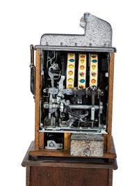 A Mills Novelty Co. Castle Front 50 Cent Slot Machine on Chief's Head Engraved Glass Stand