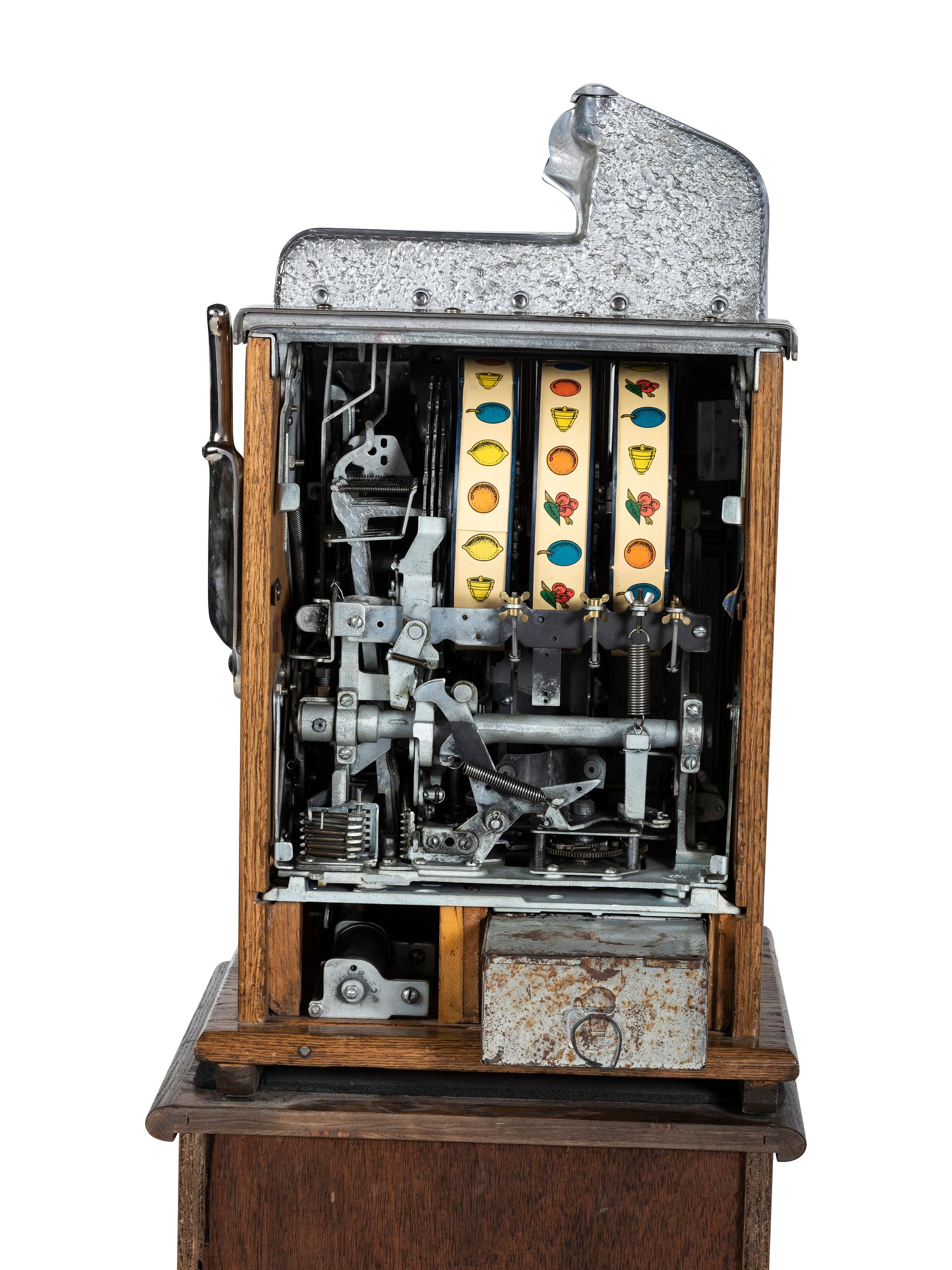 A Mills Novelty Co. Castle Front 50 Cent Slot Machine on Chief's Head Engraved Glass Stand