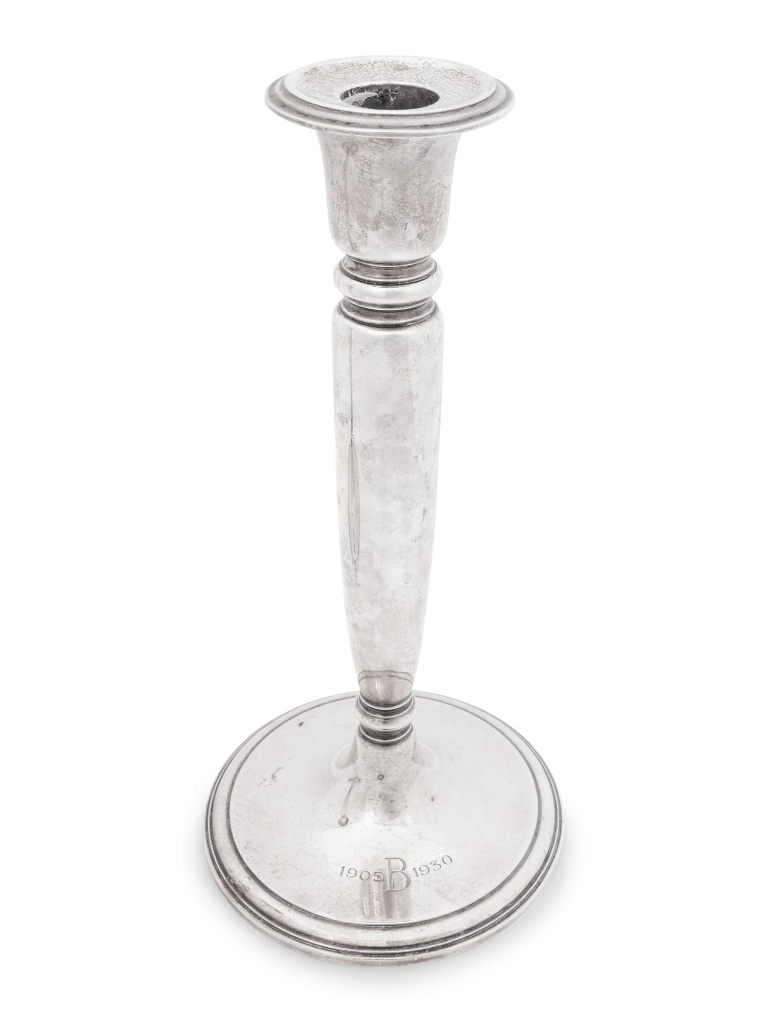 A Pair of Tiffany and Co Silver Candlesticks