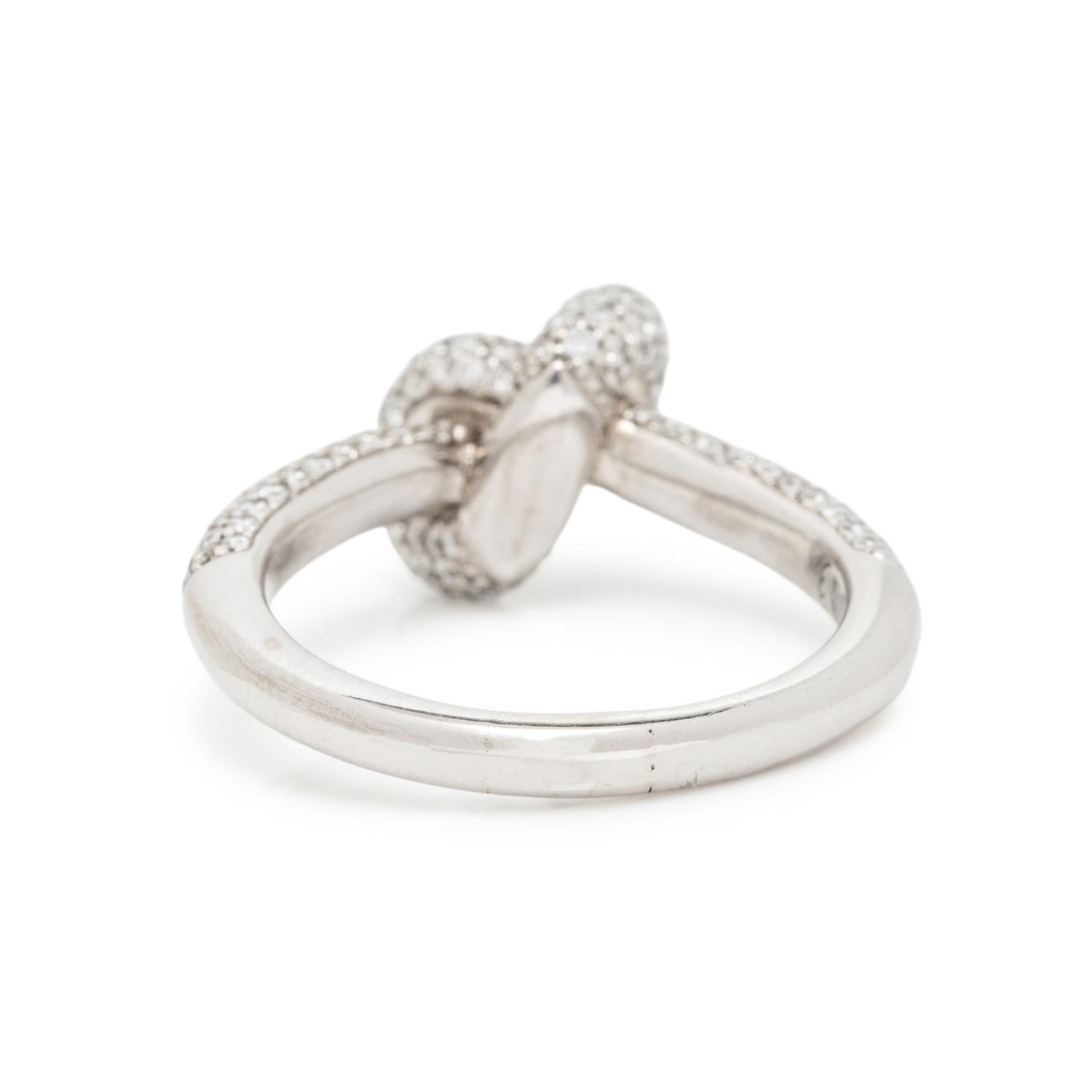 ENGLEBERT, WHITE GOLD AND DIAMOND KNOT RING