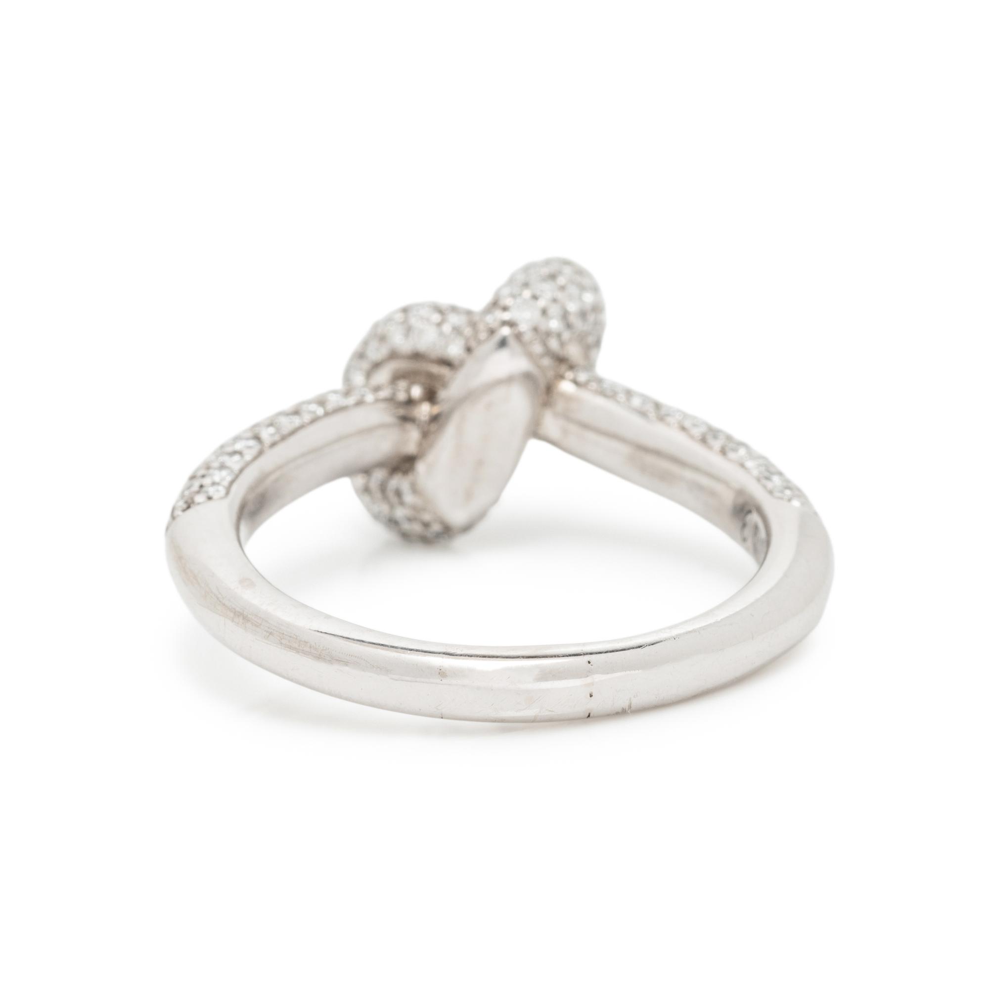 ENGLEBERT, WHITE GOLD AND DIAMOND KNOT RING