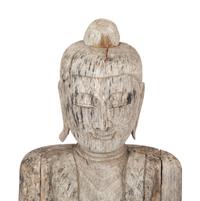 A Southeast Asian Carved Figure of Guan Yin