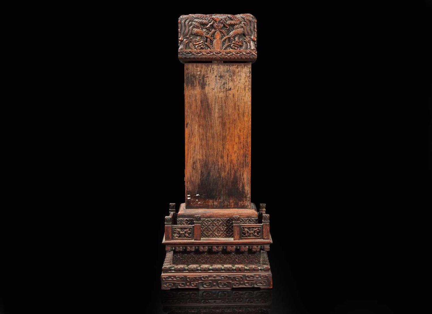 An unusual stele-form Chinese hardwood clock case 硬木鐘錶架子一件