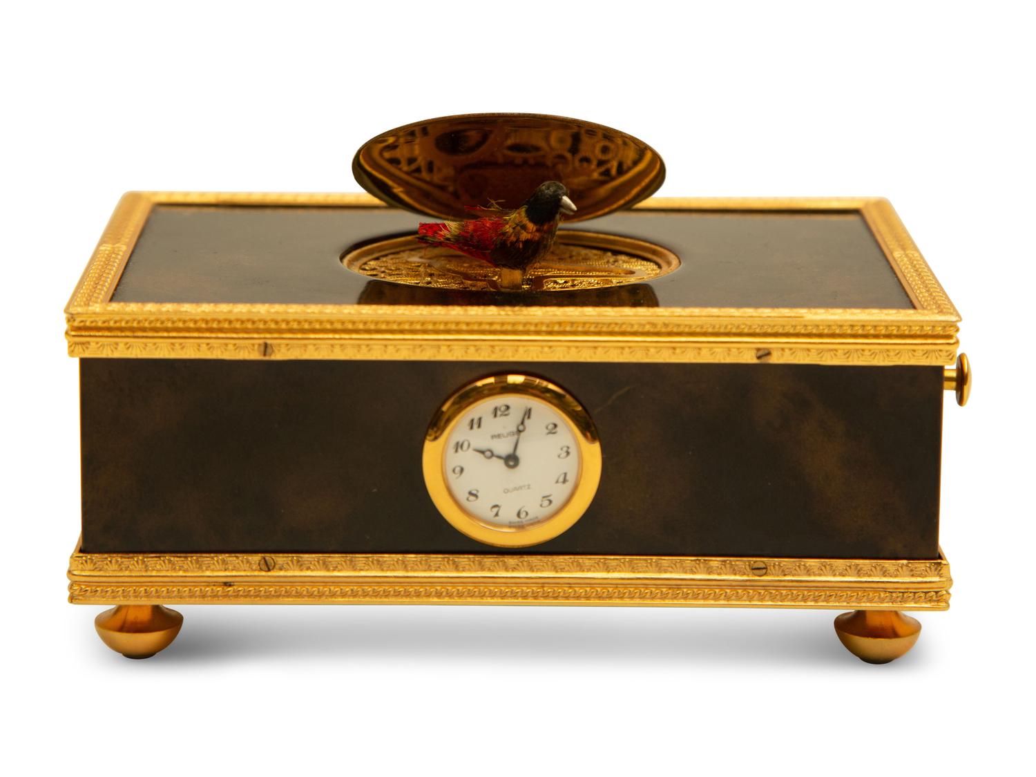 A Swiss Reuge Music Box with Bird Automaton and Clock — 20th Century
