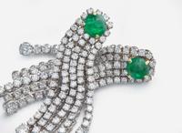 A Pair of 18K White Gold, Diamond, and Emerald Earrings